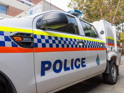 Man arrested over body found in Perth home