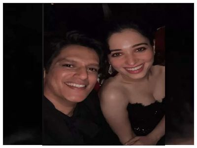 Vijay Varma photobombs rumoured girlfriend Tamannaah Bhatia at an event; the lovebirds strike a pose for the paparazzi together