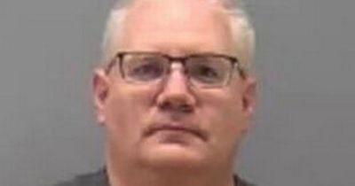 Paramedics charged with murder after 'patient tied to stretcher died from asphyxia'