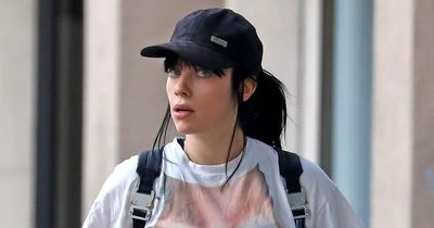 Billie Eilish wears X-rated illusion T-shirt and tiny spandex shorts to the gym