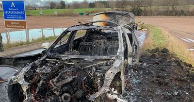 Horror images show burnt out shell of car after couple escape blazing motor