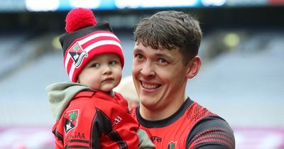 David Clifford celebrates Fossa's All-Ireland win with young son