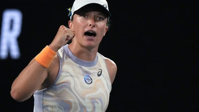 Australian Open top seeds Nadal and Swiatek reach second round
