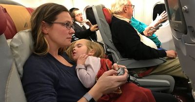 Mum on plane rages after stranger tells her children are not allowed in first class