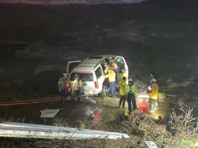 Terrifying video shows SUV dangling off California cliff after driving off road in torrential downpour