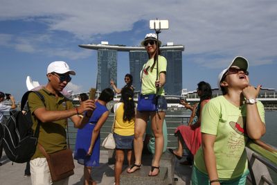 Singapore expects tourist total to double