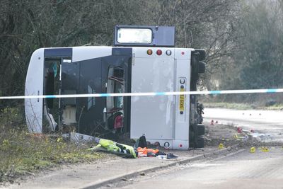 Dozens injured after double-decker bus overturns in crash with motorcycle