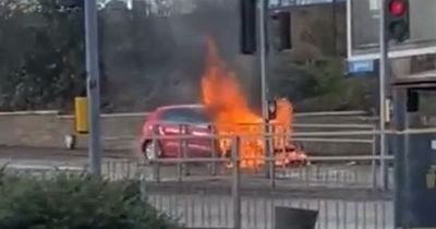 Car bursts into flames on busy Ayrshire road after crash as fire crews rush to inferno