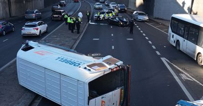 Drama as £375k Ferrari crushed and van flipped in Leeds city centre crash