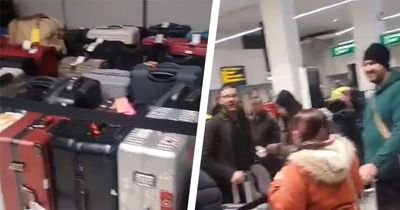 Manchester Airport chaos as bags seen piling up and travellers queuing for 'hours' after IT fault