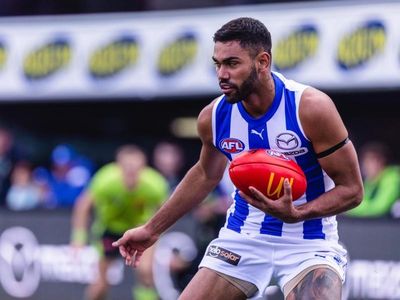 AFL's Tarryn Thomas charged by police