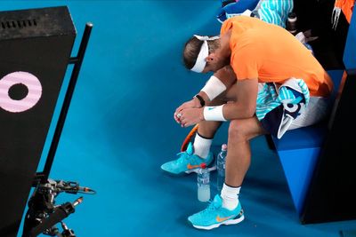 Clearly hampered Nadal loses in 2nd round of Australian Open