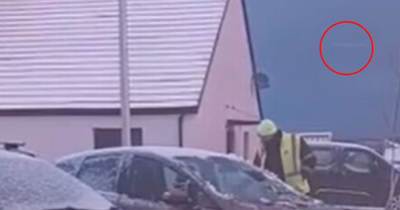 Watch as 'meteor' rips through sky at speed while Scots dad clears snow from car