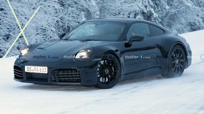 Porsche 911 Facelift Spy Shots Show Coupe Wearing Deceptive Camouflage