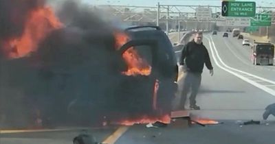 Drivers save woman from burning car on motorway as they drag her from wreckage