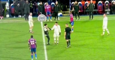 Casemiro's unusually calm reaction to pitch invader as Man Utd team-mates watch on