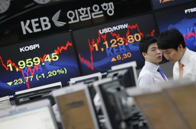 South Korea to scrap stocks registration rule for foreigners