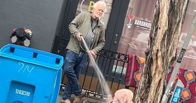 Man filmed blasting homeless woman with hose in sick viral video arrested for battery