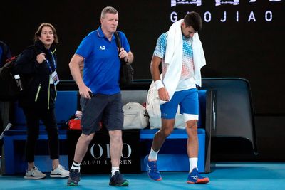 Djokovic bothered by leg, heckler during Australian Open win