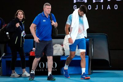 Novak Djokovic limps into round three in Melbourne as injury worries remain