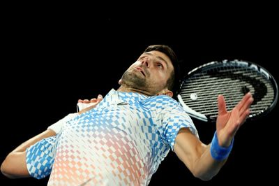 Djokovic barrels into Australian Open third round as seeds fall