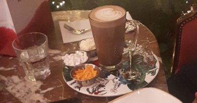 Famous cafe slammed for charging 'extortionate' prices for hot chocolate and a bun