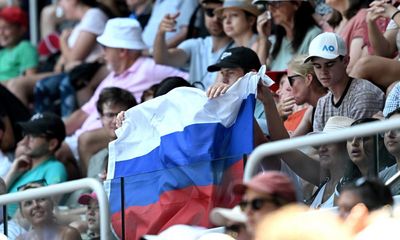 Tennis fans seen hoisting Russian flag at Australian Open despite ban