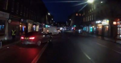 Edinburgh cyclist narrowly avoids being hit by car on busy city street