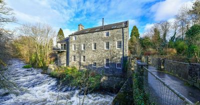 Former Scottish mill transformed into family home complete with water wheel in gym