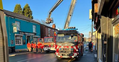 Fire crews swarm street after solar panel battery starts smoking