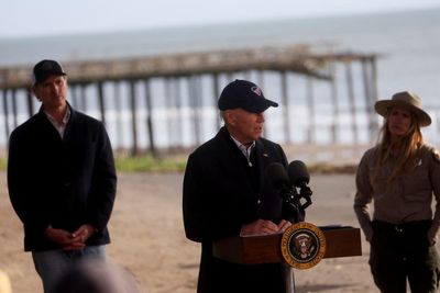 Biden links California storm damage to climate change as he surveys damage