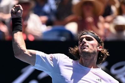 Tsitsipas says 'no presents' after ploughing on at Australian Open