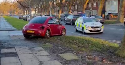 Police car and VW crash outside driving test centre