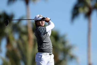 S.H. Kim shot a triple bogey on a bad break after perfect shot bounces off flag