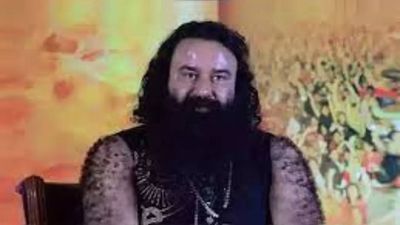 Dera Sacha Sauda chief Gurmeet Ram Rahim Singh walks out of Rohtak jail after being granted 40-day parole