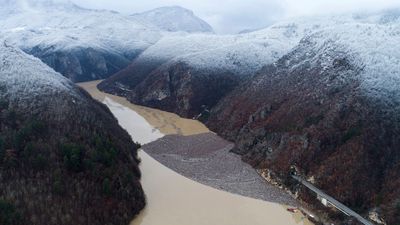 Sections of Drina River in Bosnia become floating garbage dump as torrential flooding hits Balkans