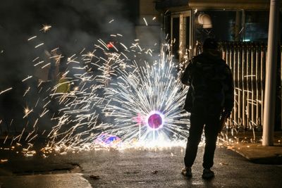 Fireworks, flowers in Wuhan for Lunar New Year but grief lingers