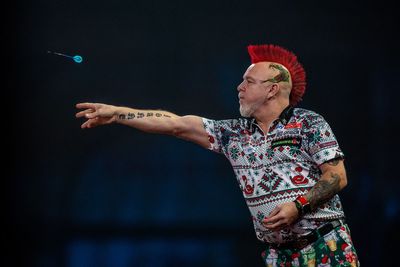Peter Wright holds off Gerwyn Price to claim Nordic Masters title