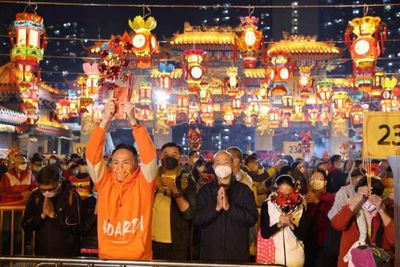 Hong Kong worshippers flock to Wong Tai Sin Temple for Lunar New Year ritual after 2-year Covid suspension