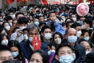 China reports nearly 13,000 Covid deaths over last week