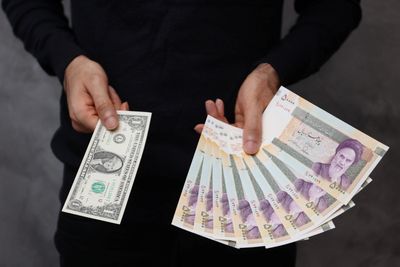 Iran’s currency hits record low amid tensions with the West