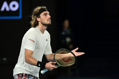 Tsitsipas survives five-set test to make Australian Open quarters