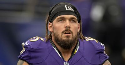 Former NFL star slammed for killing 195lb mountain lion before posing with dead animal