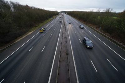 Man and woman dead and 12 injured after horror multi-vehicle crash on M40