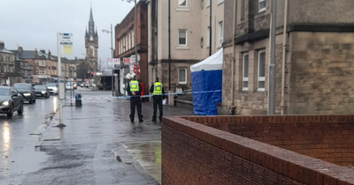 Man dies suddenly at Scots home as cops cordon off scene with blue tent