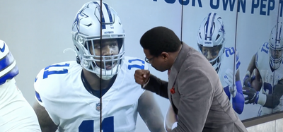 Michael Irvin felt compelled to give a fiery pep talk to photos of Cowboys players on a screen