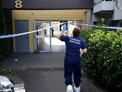 Slain woman's partner under 'house arrest'