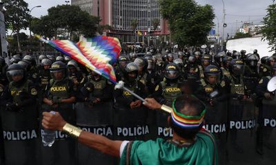 Dozens injured and police stations attacked as protests continue in Peru