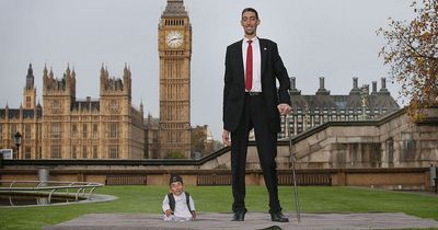 World's tallest man feared he would TRAMPLE on world's shortest during historic meeting