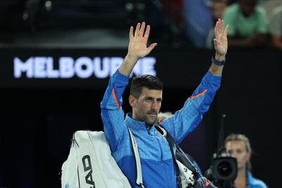 Australian Open day eight: Novak Djokovic storms through and Magda Linette adds to upsets